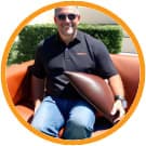 Leather Restoration Technician Repairing a Leather Couch