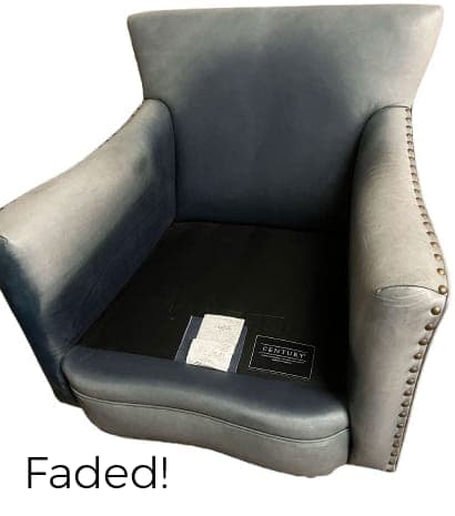 Faded brand-name leather chair before restoration Faded brand-name leather chair before restoration