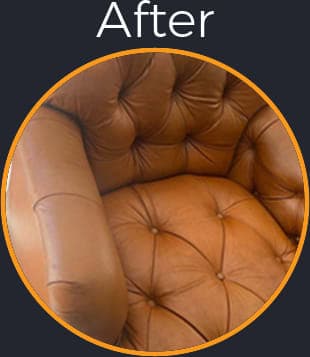 Color faded, oily tan aniline leather chair successfully restored & back in the living room looking good - After Picture