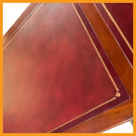 Step 1 of leather desk restoration showing assessment and cleaning process Step 1 of leather desk restoration showing assessment and cleaning process